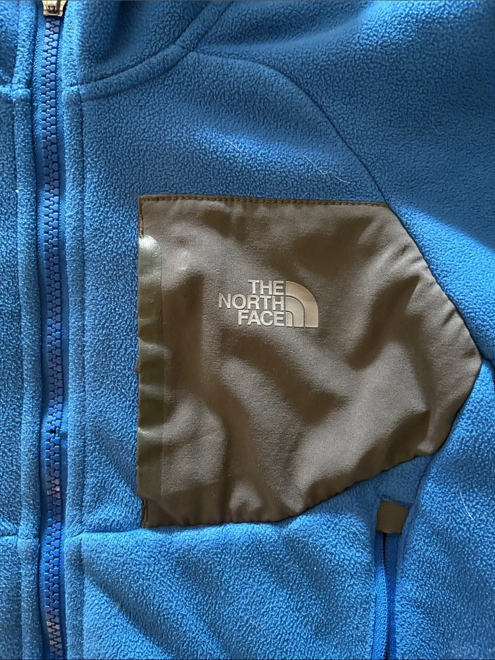 The North Face Kids Blue Hooded Fleece Jacket with Gray Pocket
